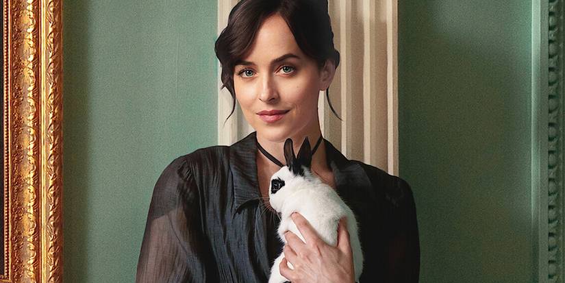 Anne Elliot (Dakota Johnson) holding a rabbit in Persuasion