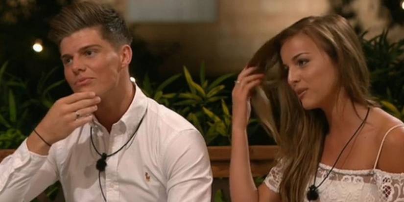 Danielle and Chris B looking in the same direction in Love Island UK