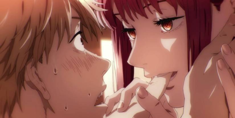 Makima bites Denji's finger in a sensual scene during the Chainsaw Man trailer from the upcoming Chainsaw Man anime.