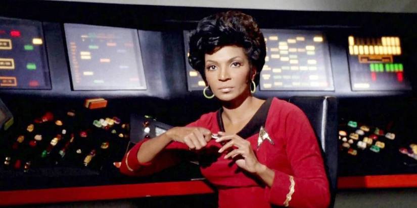 Nichelle Nichols as Uhura in front of her monitors Star Trek The Original Series