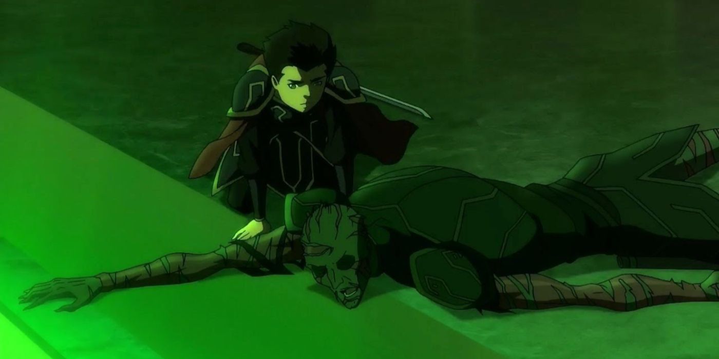 Damian Kneeling Beside Ra's al Ghul's Burnt Corpse in Son of Batman