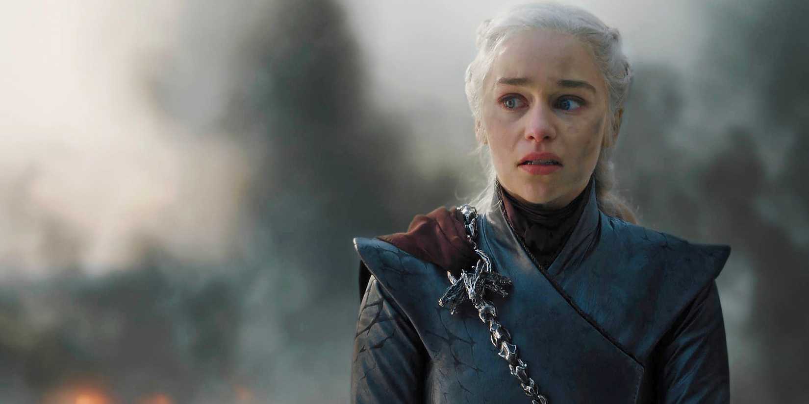 8 Great TV Characters Ruined By A Single Episode 6 Daenerys Targaryen looking emotional while smoke blows behind her in Game of Thrones.