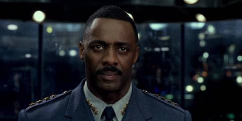 Idris Elba in close-up wearing a 4-star general's uniform in Pacific Rim