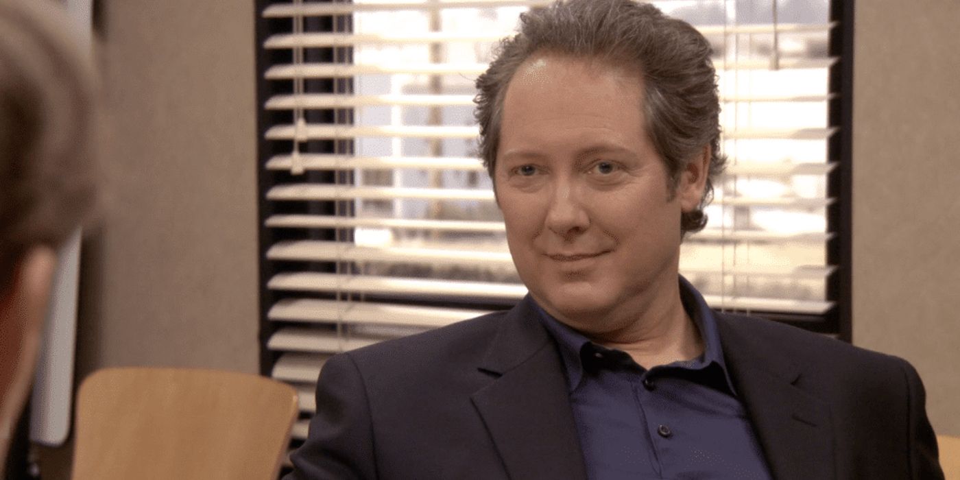 Robert California (Jams Spader) smirking in The Office.