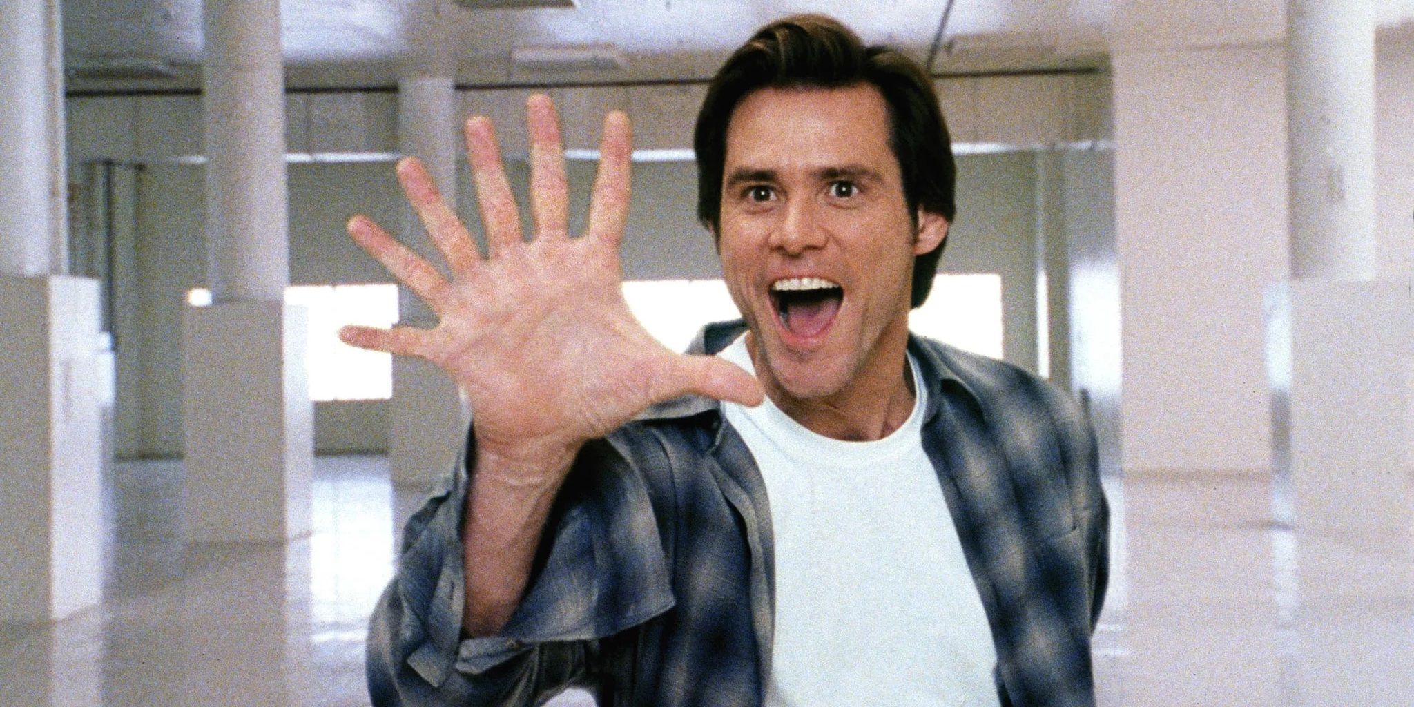 Jim Carrey com sete dedos em Bruce Almighty