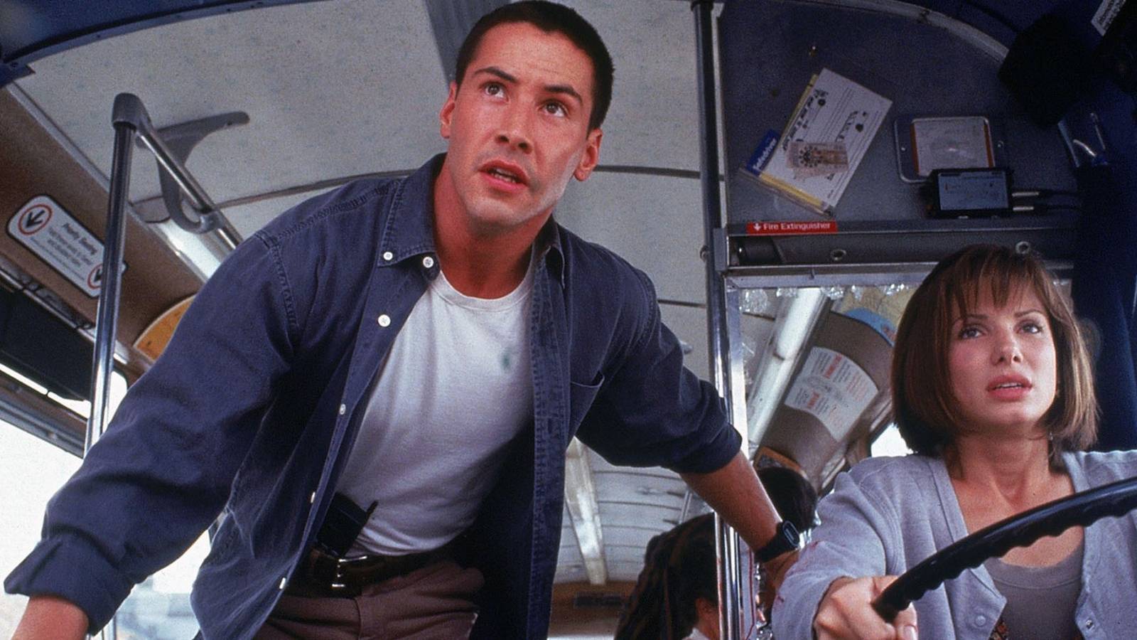 Keanu Reeves and Sandra Bullock on a bus in Speed