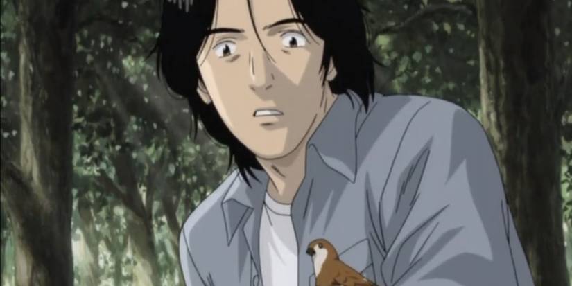 Kenzou Tenma ist überrascht, als er in „Monster“ einen kleinen Vogel auf seinem Arm landen sieht.