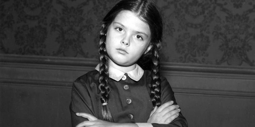 Lisa Loring as Wednesday crossing her arms in The Addams Family Sitcom