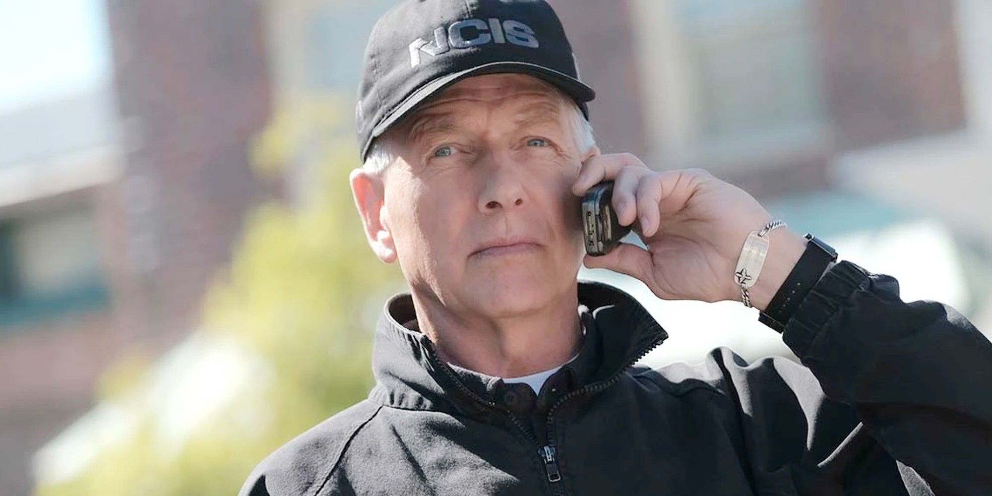 NCIS Mark Harmon as Leroy Jethro Gibbs talking to someone on his phone