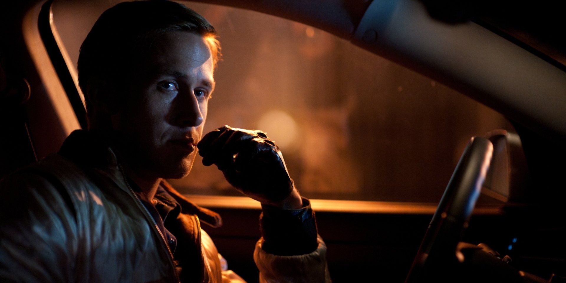 Ryan Gosling's Driver sitting in a car in Drive
