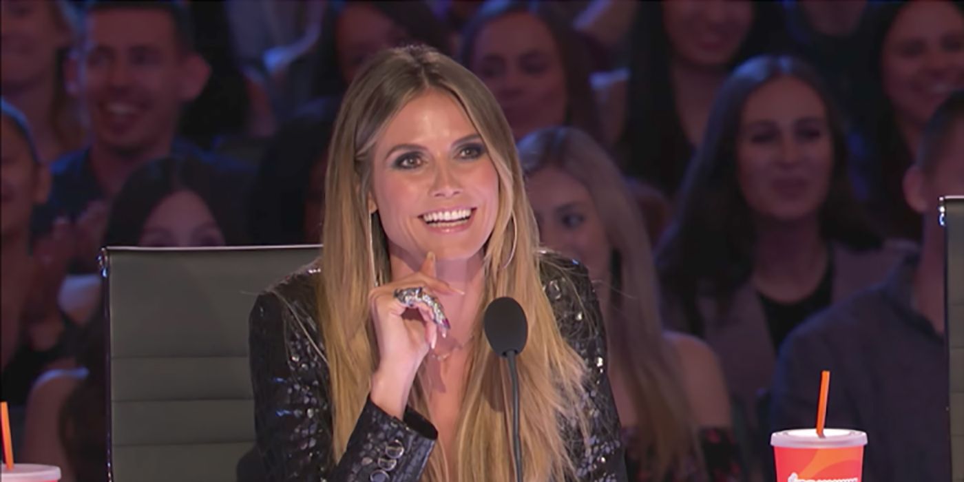 Heidi Klum smiling while judging America's Got Talent.