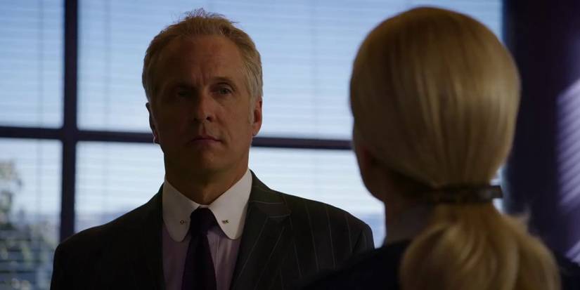 Howard (Patrick Fabian) from Better Call Saul looking at Kim (Rhea Seehorn), stonefaced.