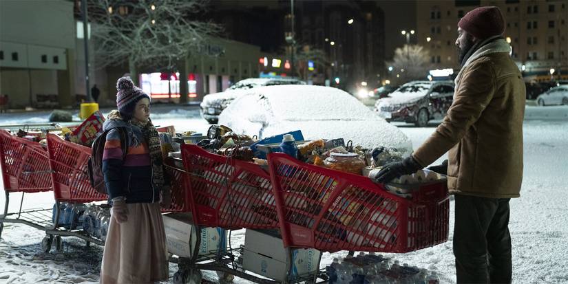 10 Best Single-Season Shows That Only Got Better Over Time 8 A man and a little girl with many shopping carts in the snow in Station Eleven.