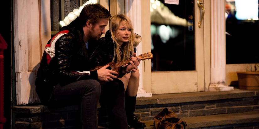 Ryan Gosling and Michelle Williams as Dean and Cindy sit on steps in Blue Valentine 