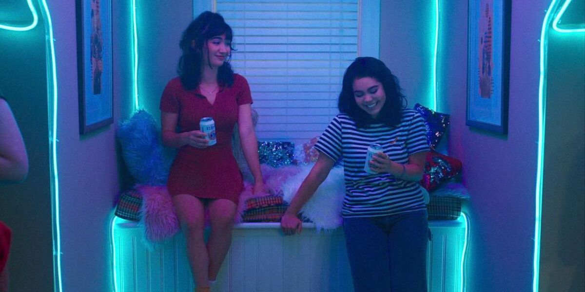 Paige and AJ at a party in Crush (2022)