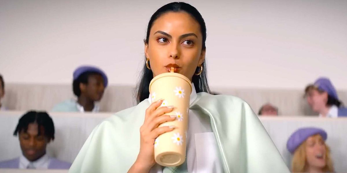 Drea drinking from her cup in Do Revenge
