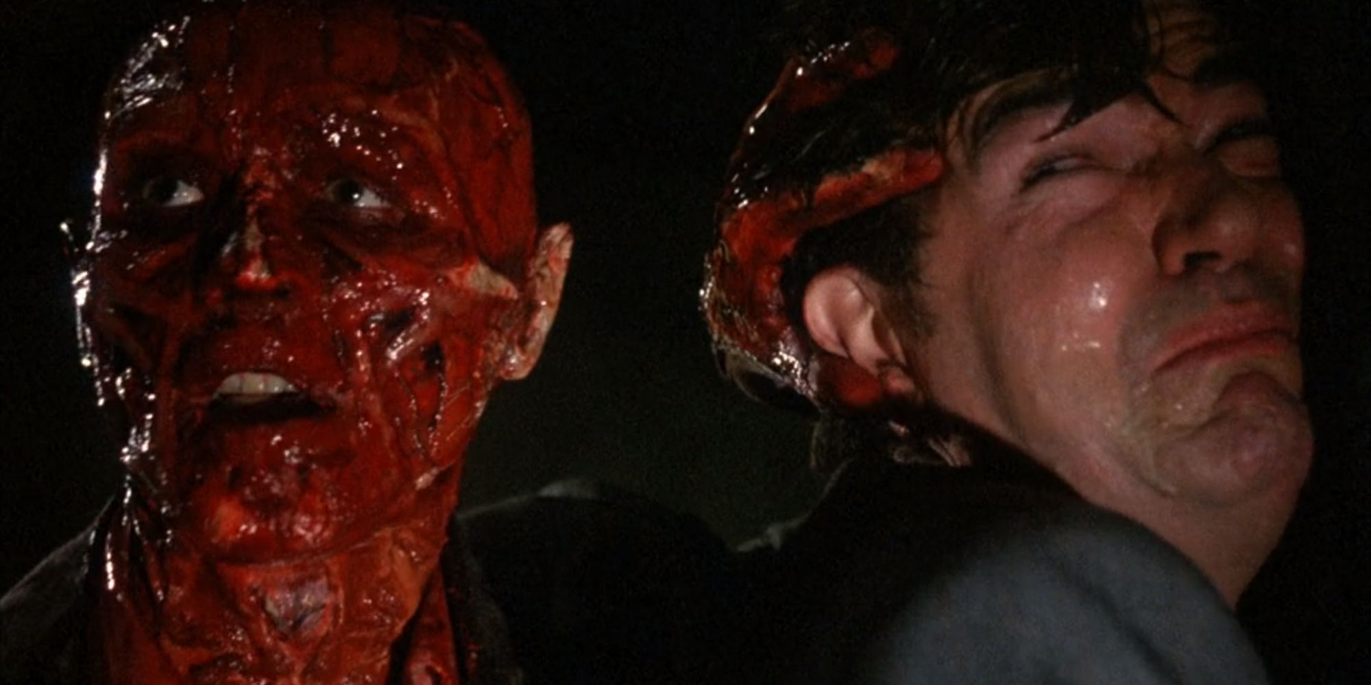 Frank Cotton in his undead form holding the third victim agains the wall in Hellraiser (1987)