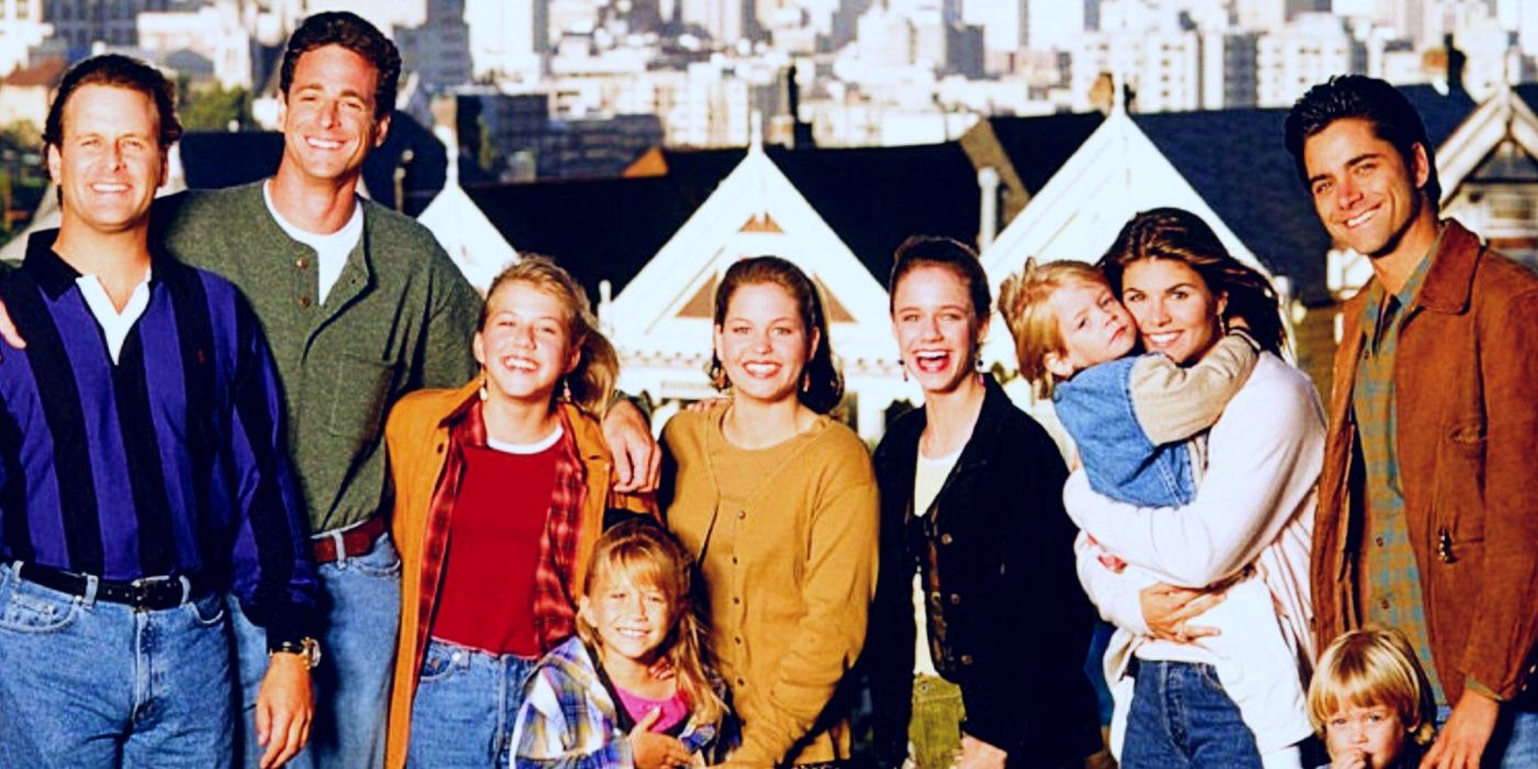 The Full House cast posing in front of the iconic San Francisco row houses