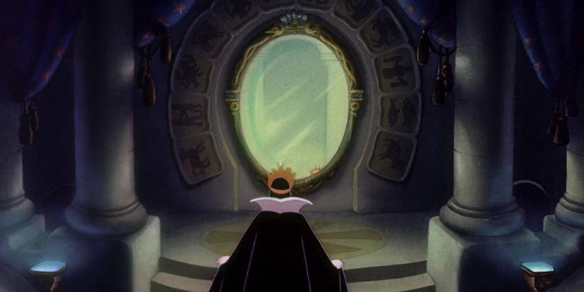 The Queen walks up to her magic mirror in Snow White and the Seven Dwarfs.