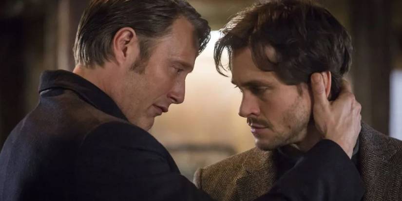 Hannibal (Mads Mikkelsen) holds Will's (Hugh Dancy) head in Hannibal