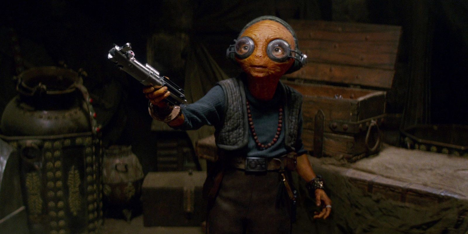 Maz Kanata with Luke's lightsaber in The Force Awakens