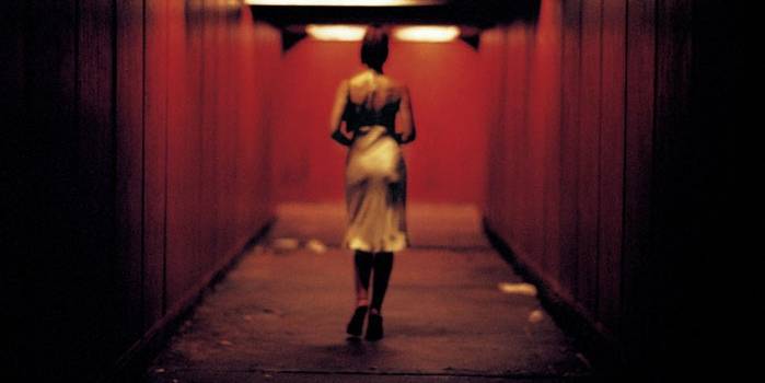 Monice Bellucci walks down a hall in Irréversible
