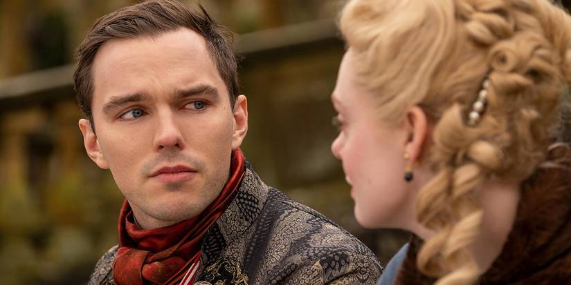 Nicholas Hoult looking at Elle Fanning in The Great 