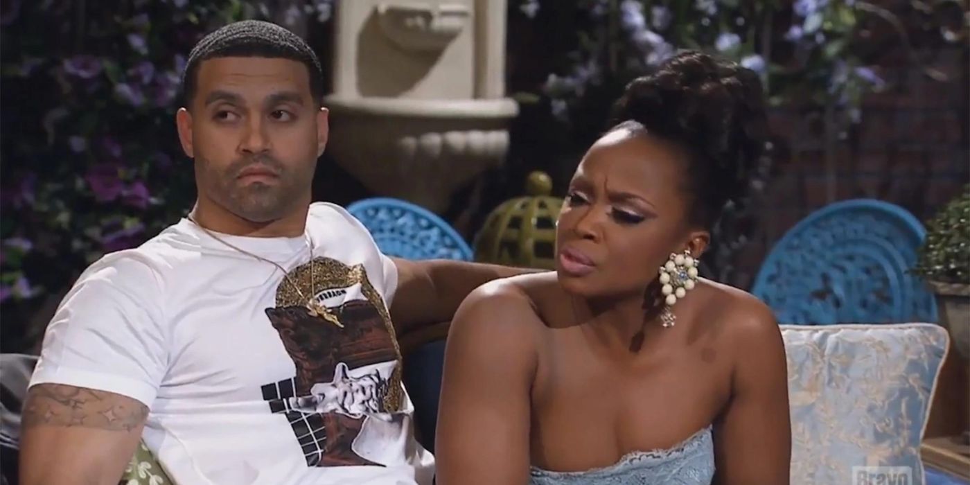 Phaedra and Apollo sitting on a couch at the reunion on RHOA
