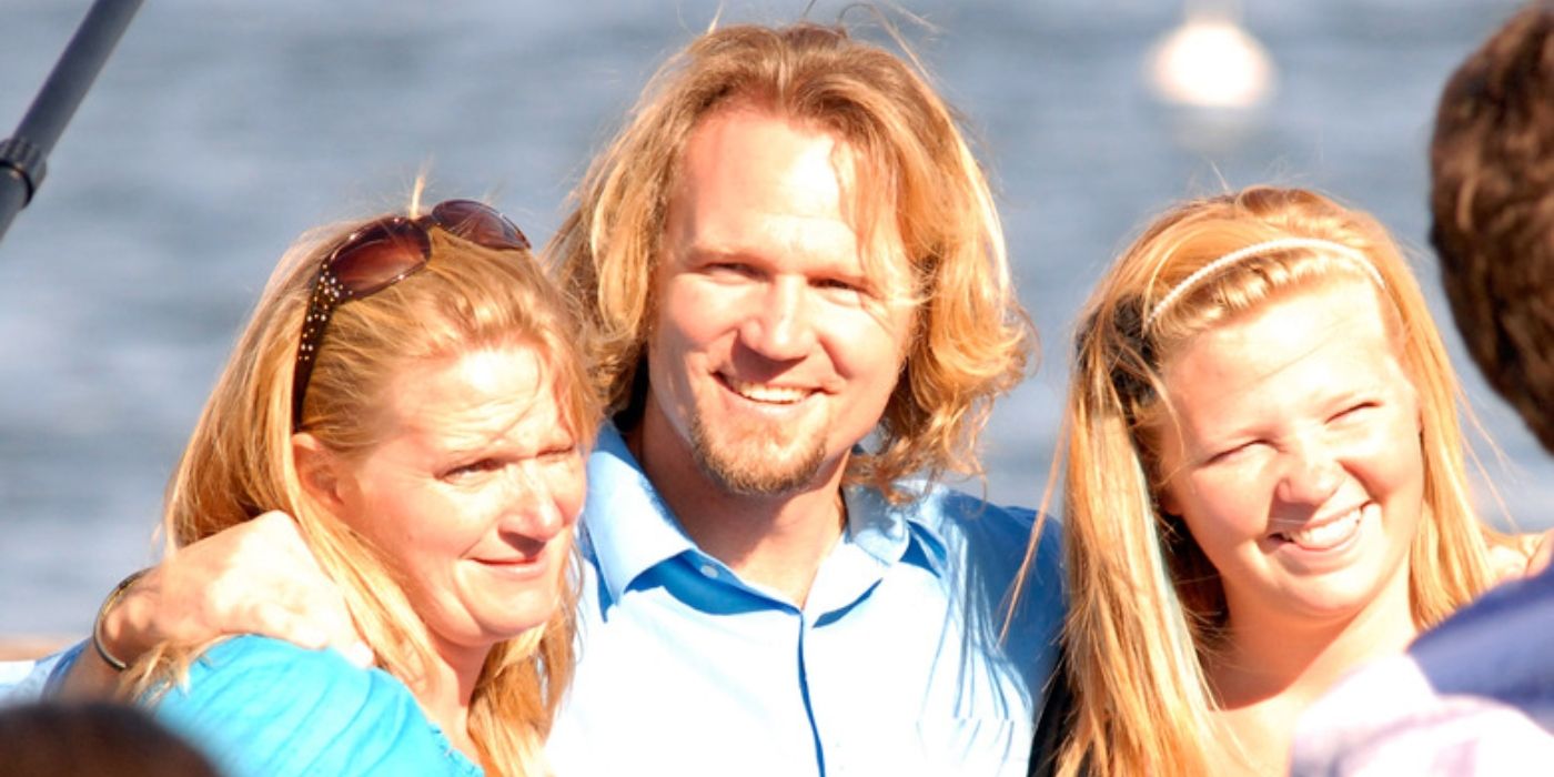Kody Brown with Christine Brown on Sister Wives and daughter posing in bright sunlight