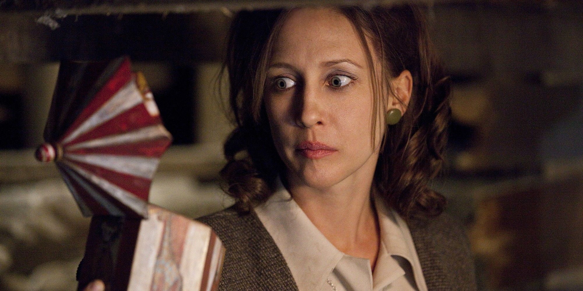 Vera Farmiga as Lorraine Warren holding music box in The Conjuring