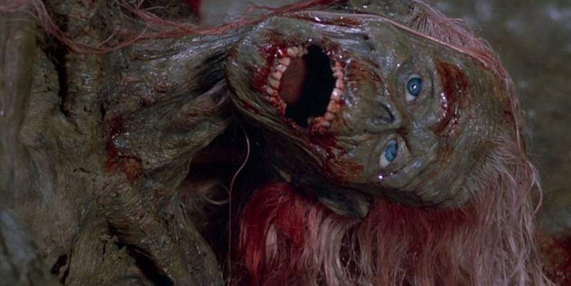 The Return of the Living ᴅᴇᴀᴅ disgusting face of zombie with blood