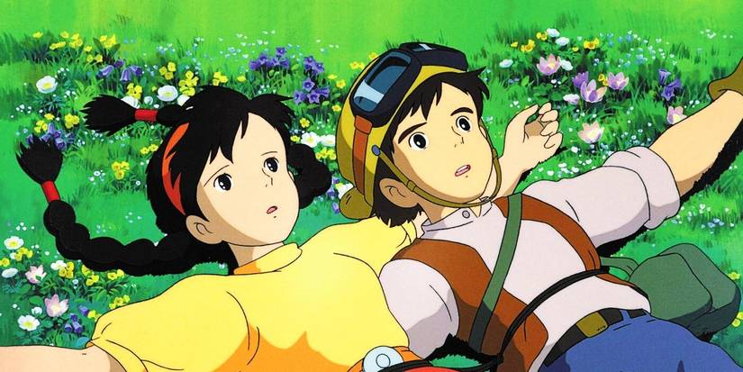 Pazu and Sheeta lying in a field together in Castle in the Sky