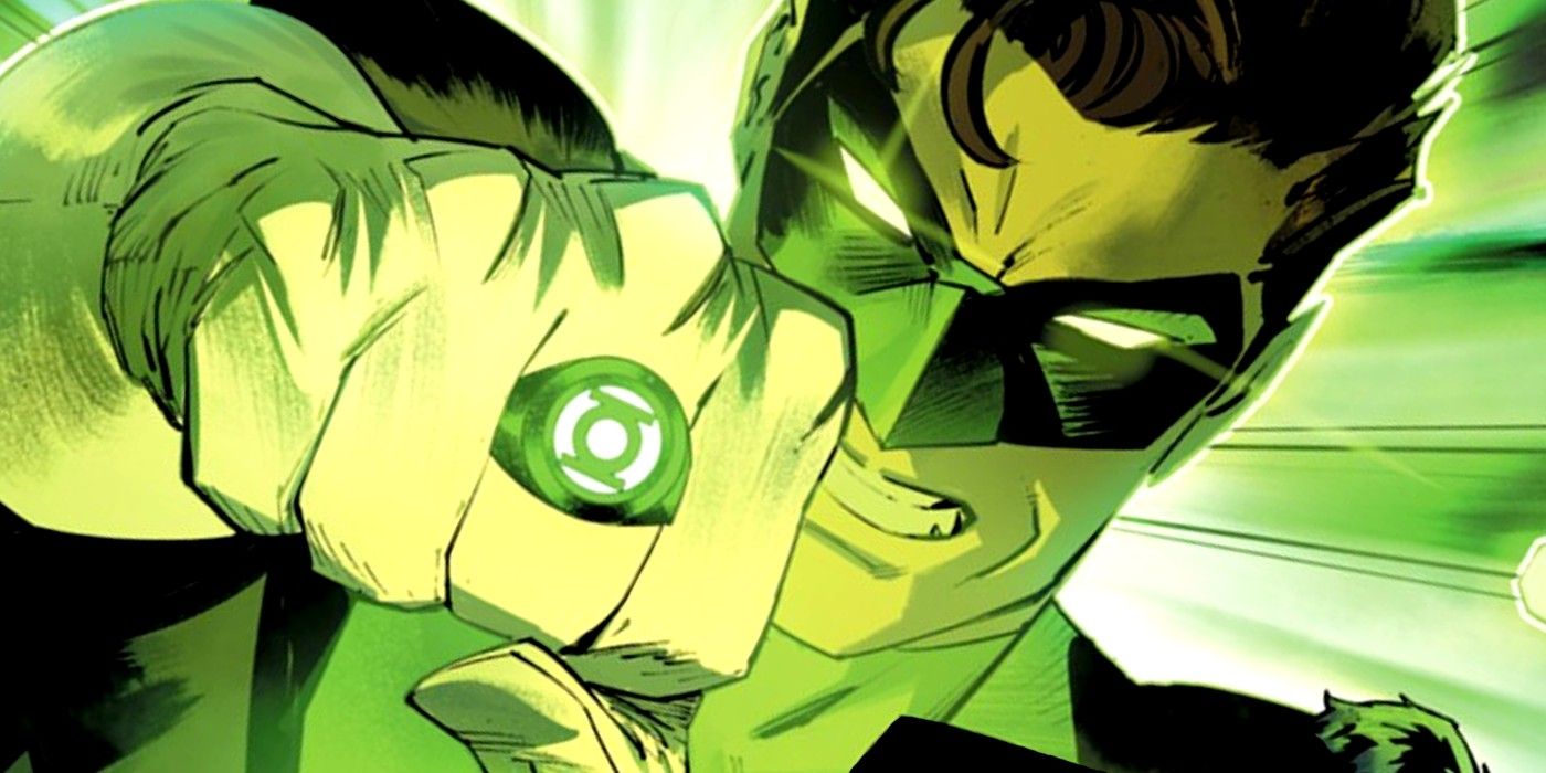 Green Lantern Hal Jordan points at the screen with his lantern ring.