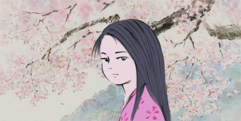 the tale of the princess kaguya screen cap of Kaguya looking to the side in front of a cherry blossom tree.