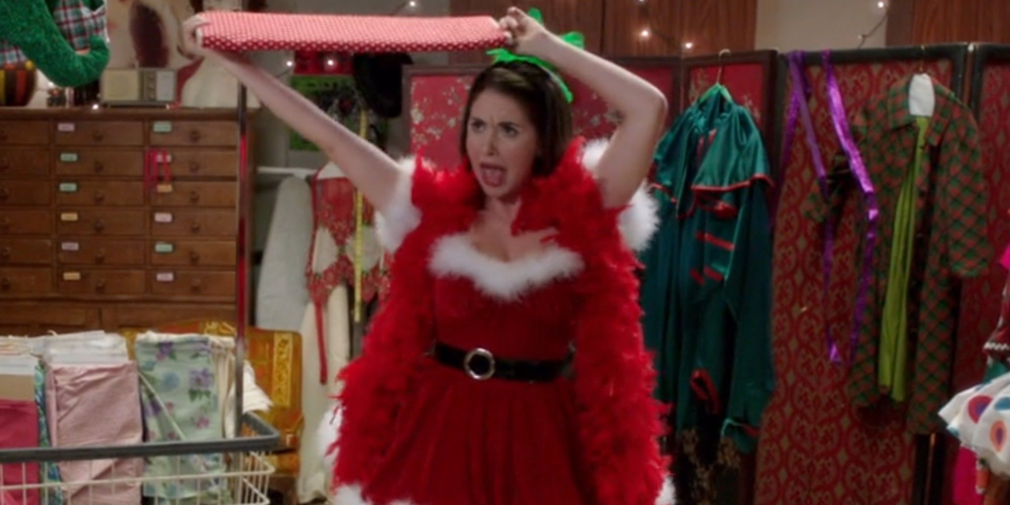 Annie dancing in a Christmas outfit in Community