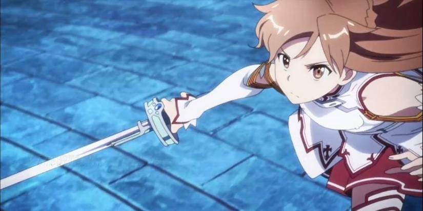 Asuna darts forward, sword drawn, in Sword Art Online