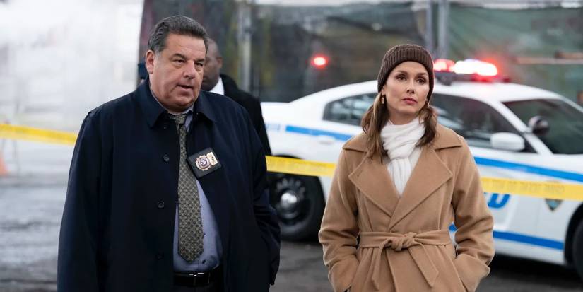 Blue Bloods Erin and  Anthony standing a crime scene on a winter day 