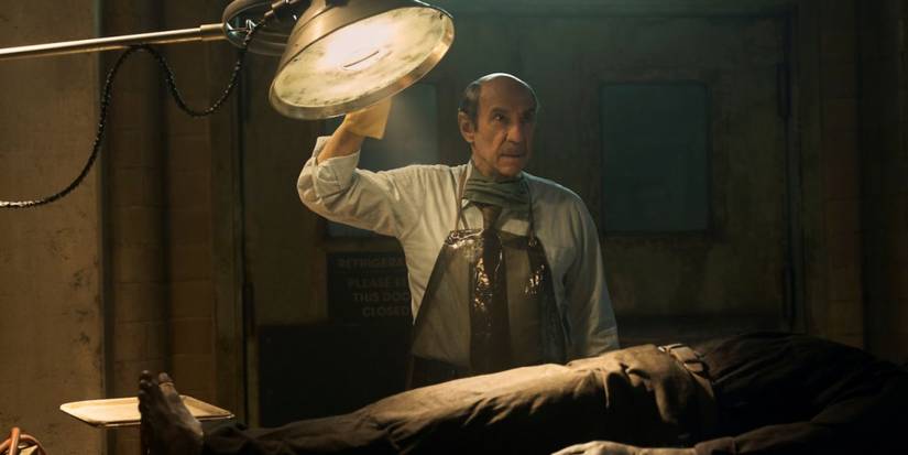 F. Murray Abraham’s Dr. Carl Winters inspecting a body in Cabinet of Curiosities’ The Autopsy