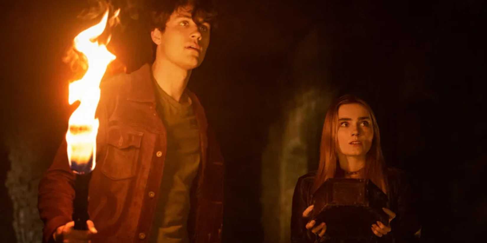 John and Mary Winchester in a dark room in The Winchesters