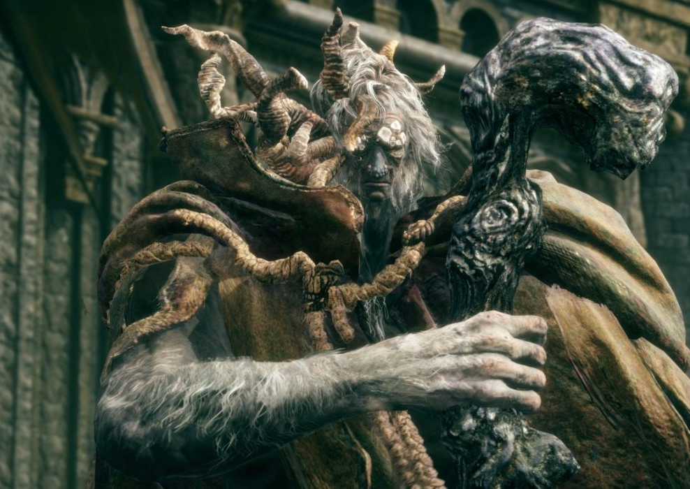 Margit, the Fell Omen from Elden Ring, standing near the gate to Stormveil Castle holding his staff.