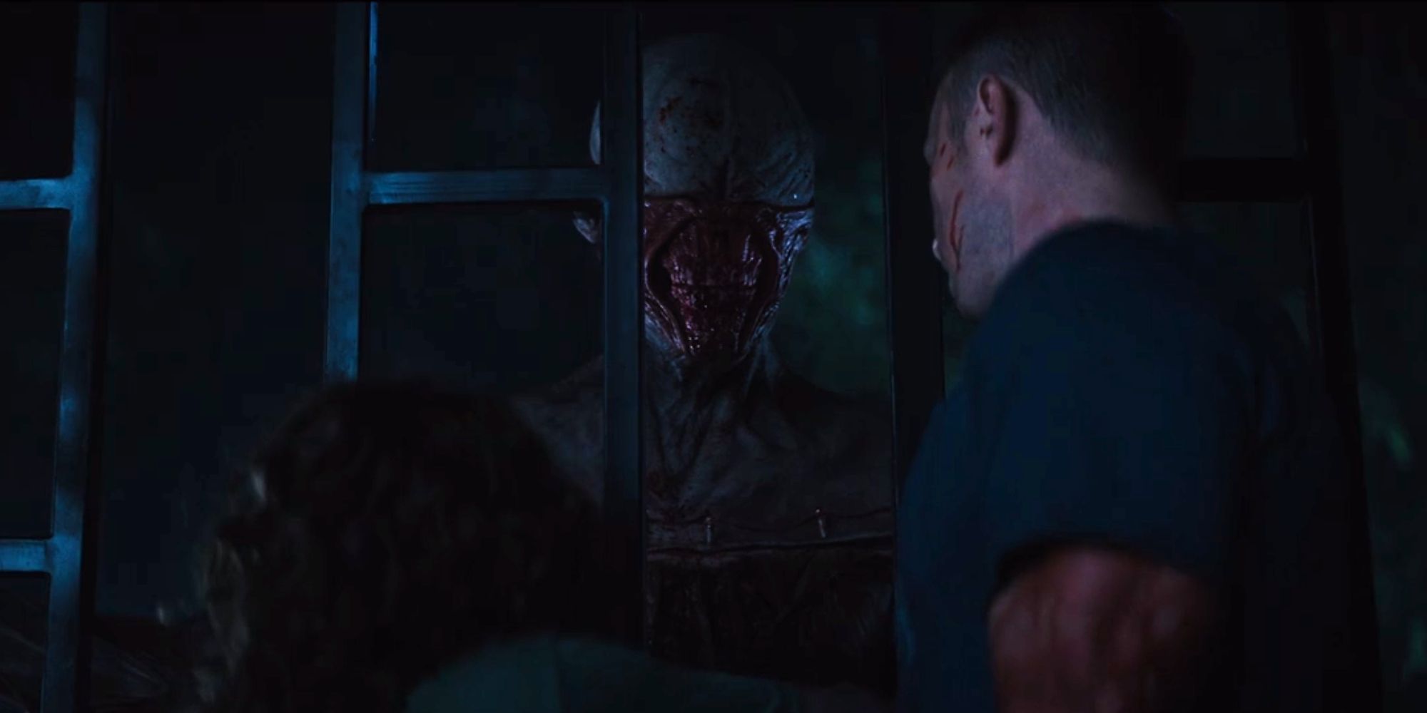 Riley-stabbing-the-Chatterer-Cenobite-with-the-puzzle-box-in-Hellraiser-(2022) Every Cenobite In The Hellraiser Movies (Including The 2022 Reboot)