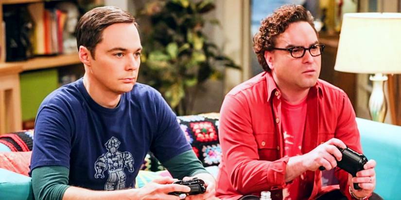 Jim Parsons as Sheldon and Johnny Galecki as Leonard playing videogames in TBBT.