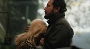 Rip Wheeler holding Beth Dutton in the Yellowstone season 5 trailer