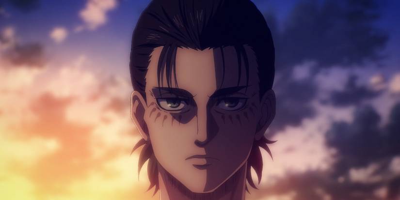 8 Seriously Dark Moments In Fantasy TV Shows 2 Eren's solemn face is shown in light and shadow in Attack on Titan