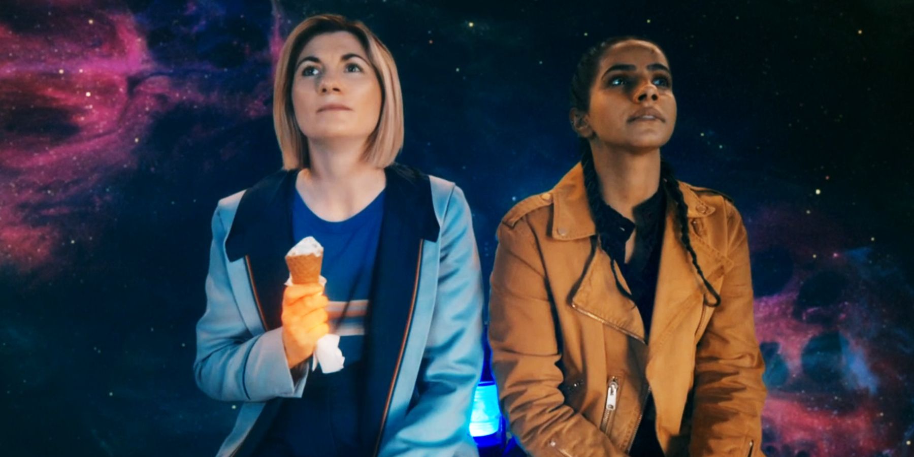 Jodie Whittaker and Mandip Gill sitting together in The Power of the Doctor