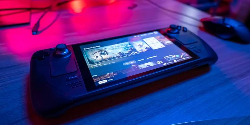 Steam Deck on Desk near Glowing Lights About to Play Titanfall Perhaps