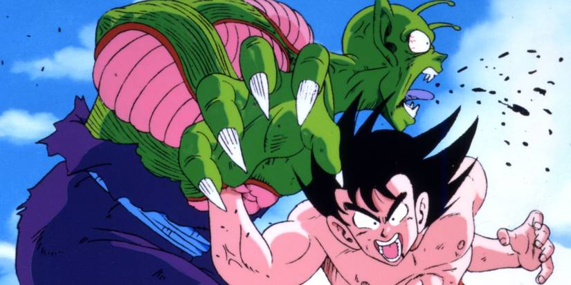 Goku punching Piccolo in the chest - Dragon Ball.