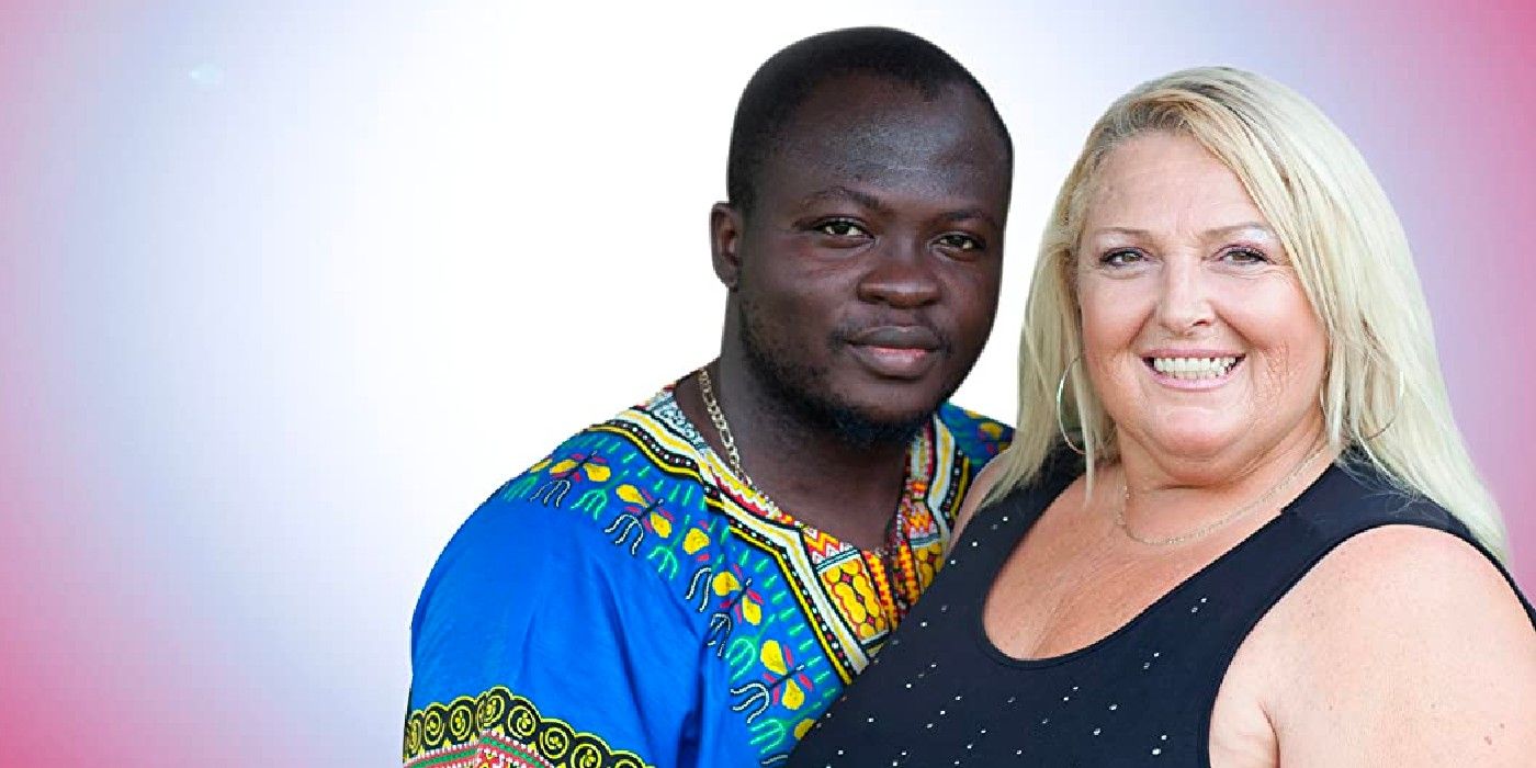 Angela Deem and Michael Ilesanmi standing lose and smiling in 90 Day Fiancé promo photo