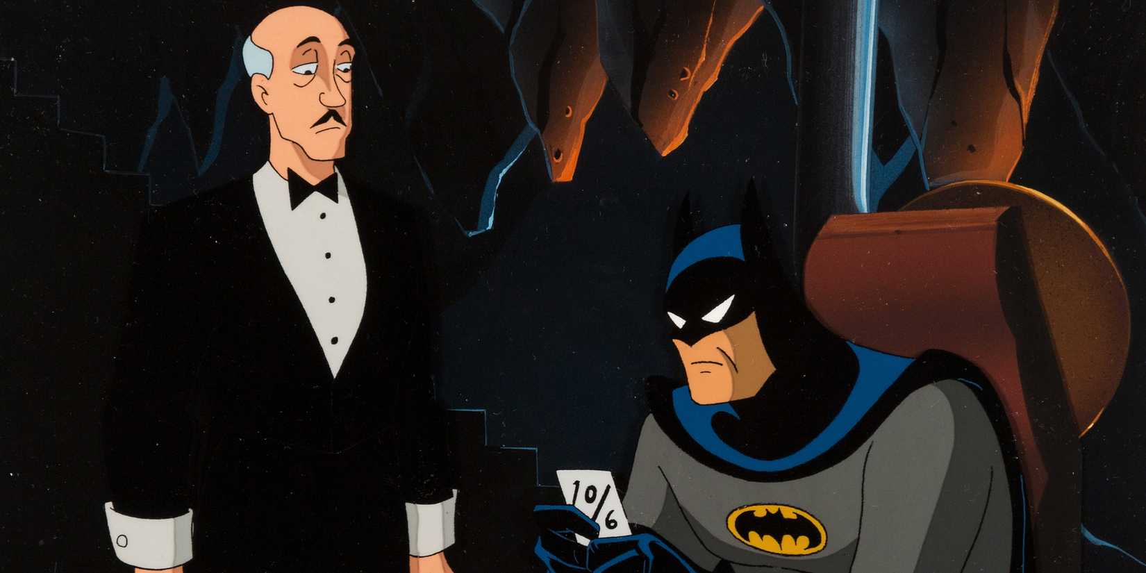 Batman e Alfred investigando na Batcaverna em Batman The Animated Series