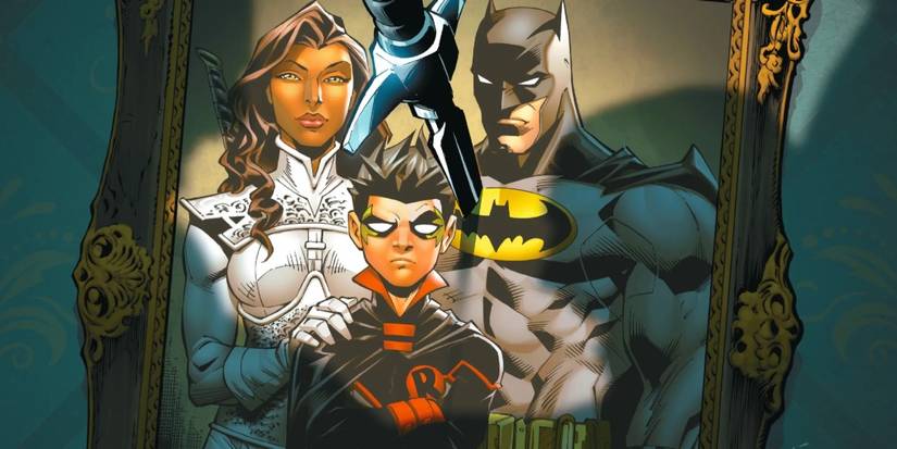 A knife sticks out of a picture of Talia, Bruce, and Damian Wayne from DC Comics